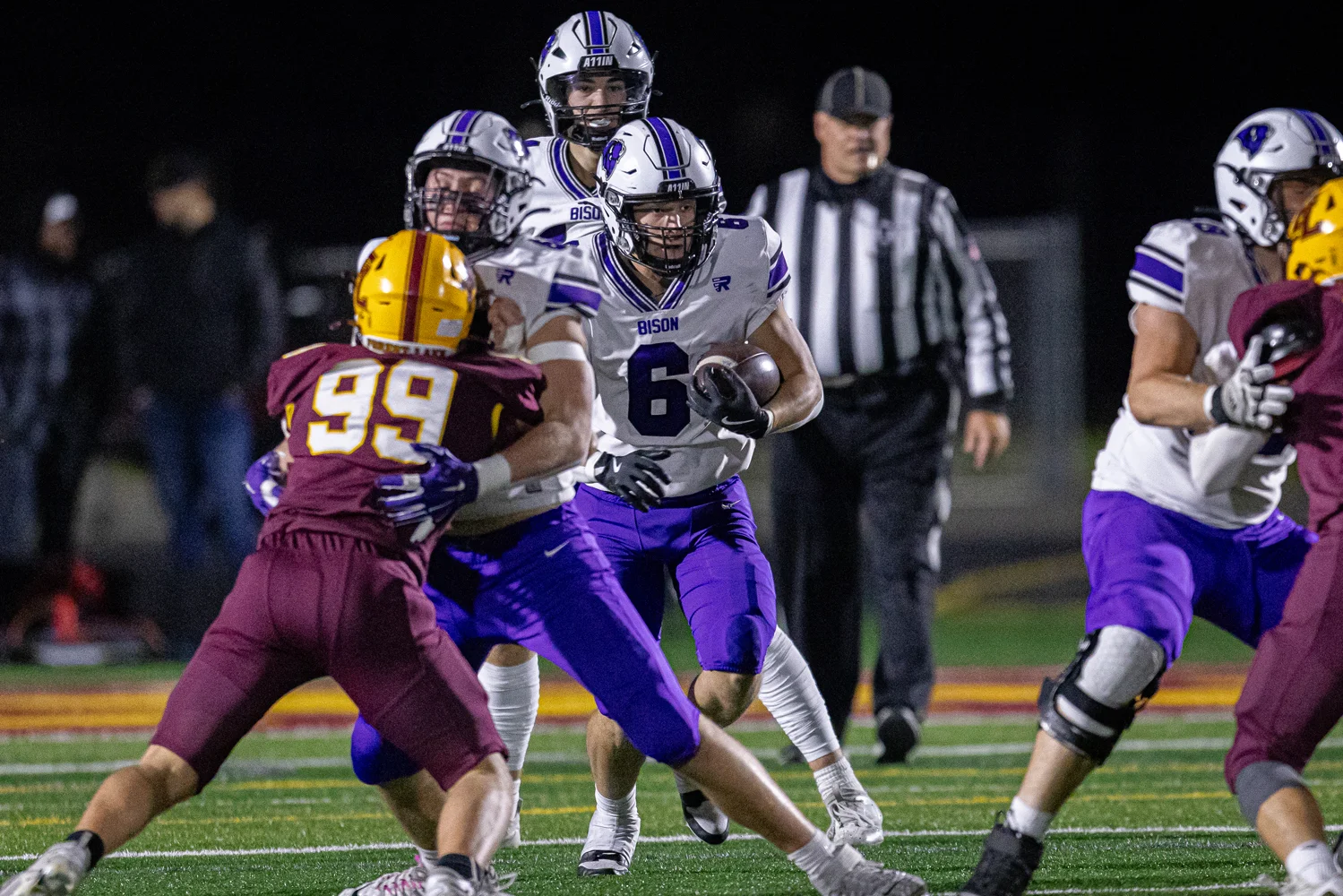 RB hitting the hole for the Buffalo Bison