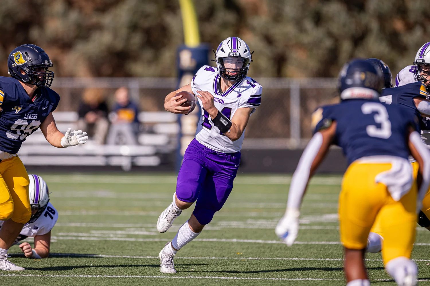 Bison QB getting out of the pocket and running down field